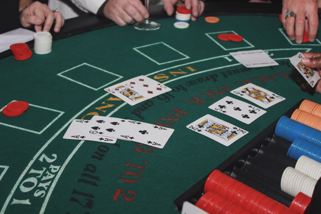 A photo of cards on a blackjack table.