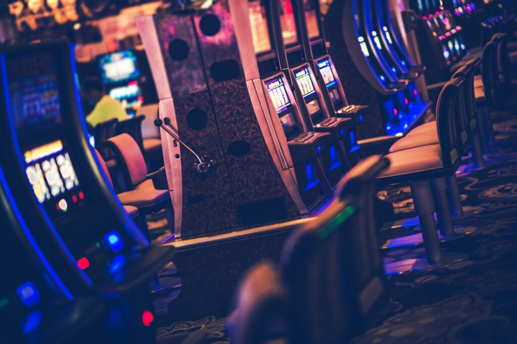 A photo of multiple slot machines inside a casino.