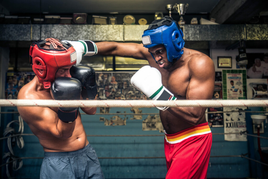 A photo of two boxers fighting.
