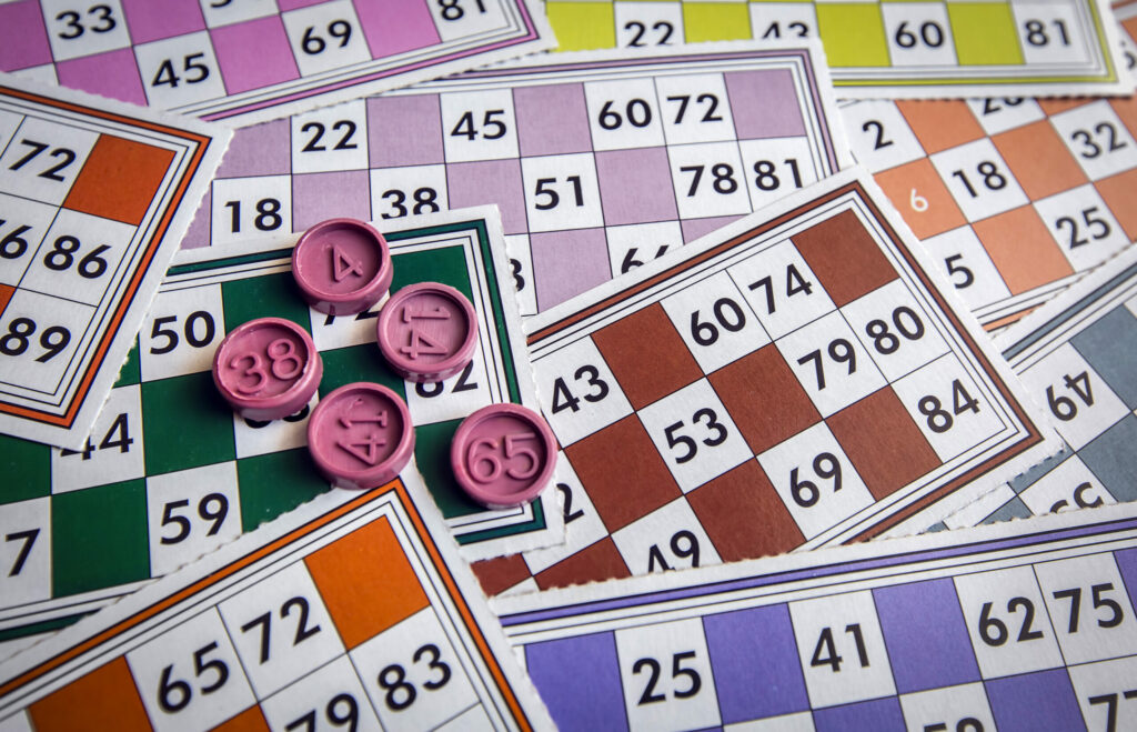 A close up photo of bingo cards.