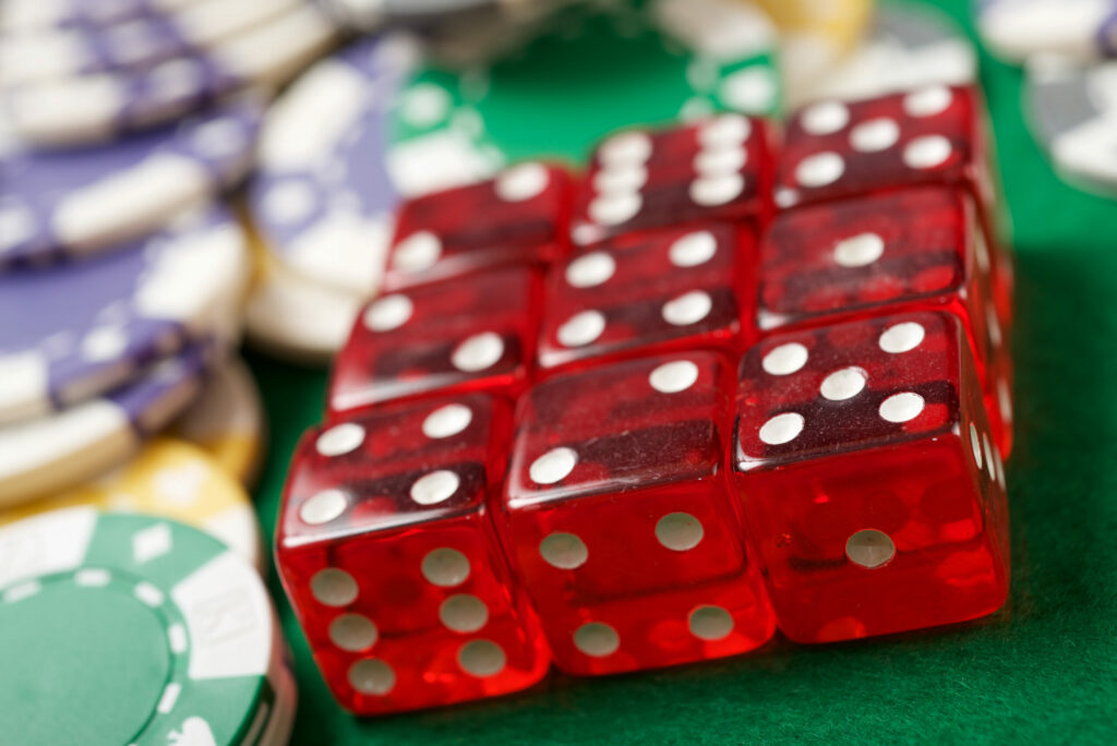 A close up photo of casino dice.