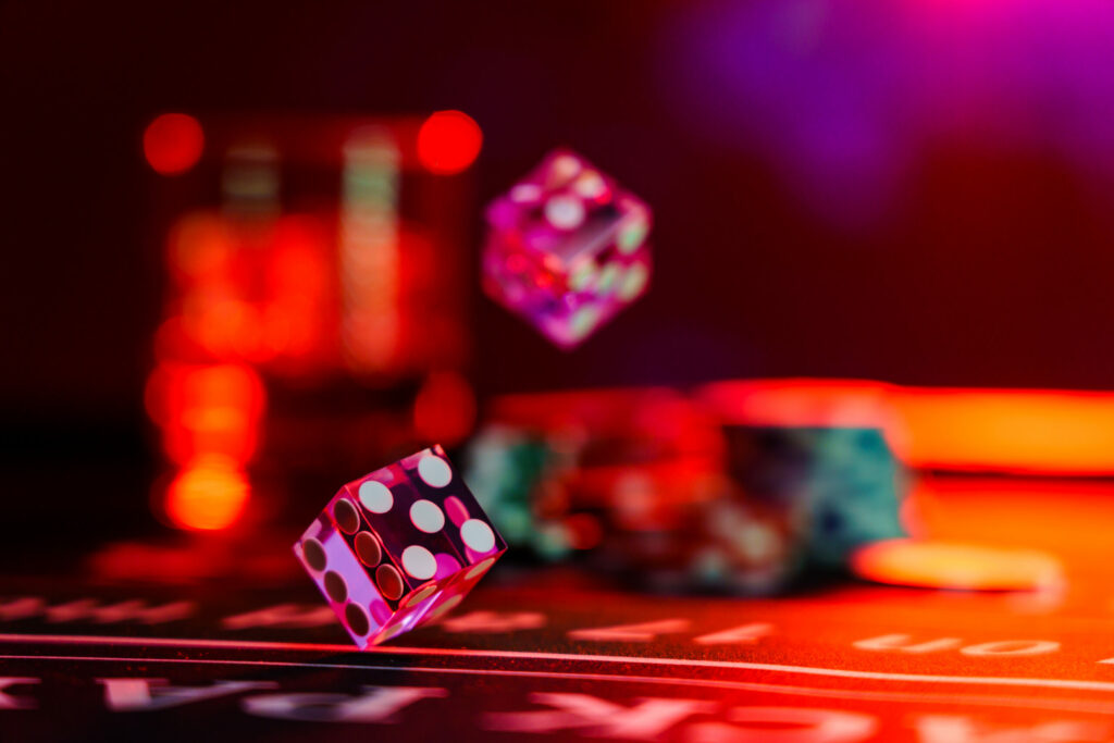A close up photo of casino dice.