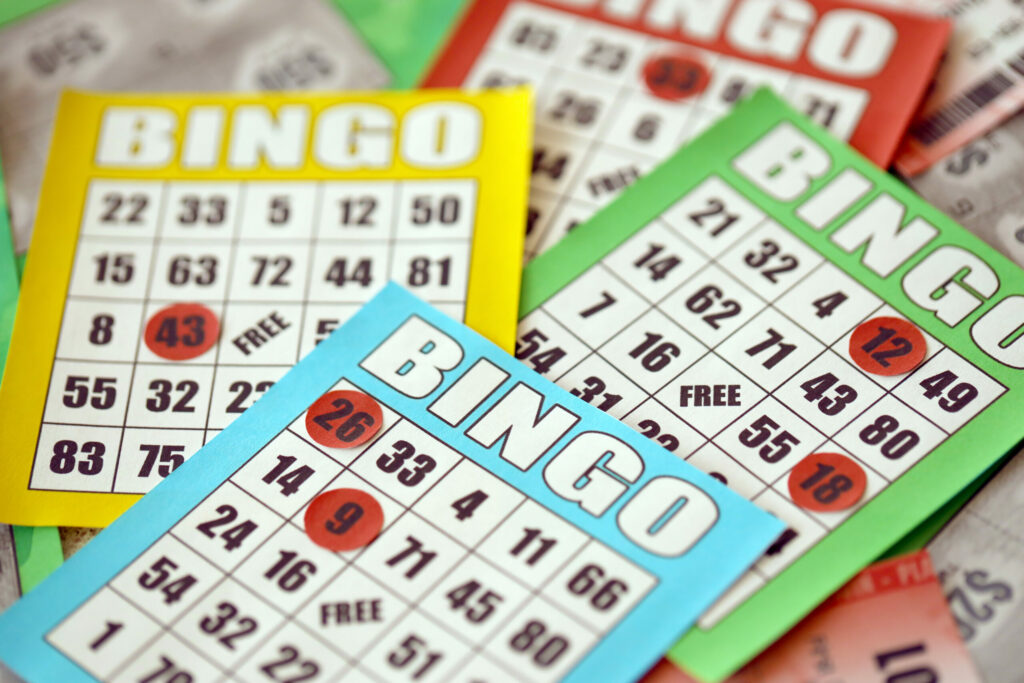 A close up photo of bingo cards.