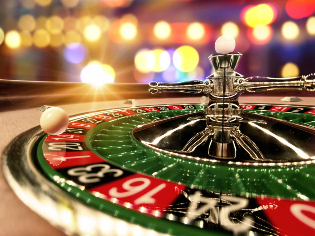 Close up of a spinning roulette wheel at a casino.