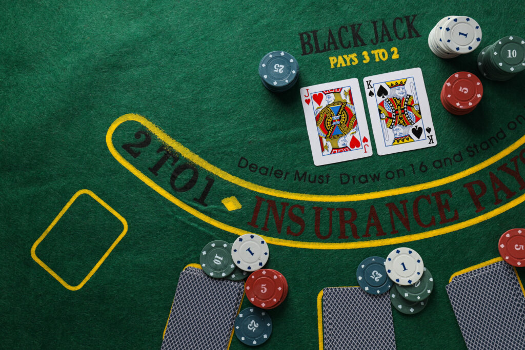 Blackjack table with blackjack game in play.