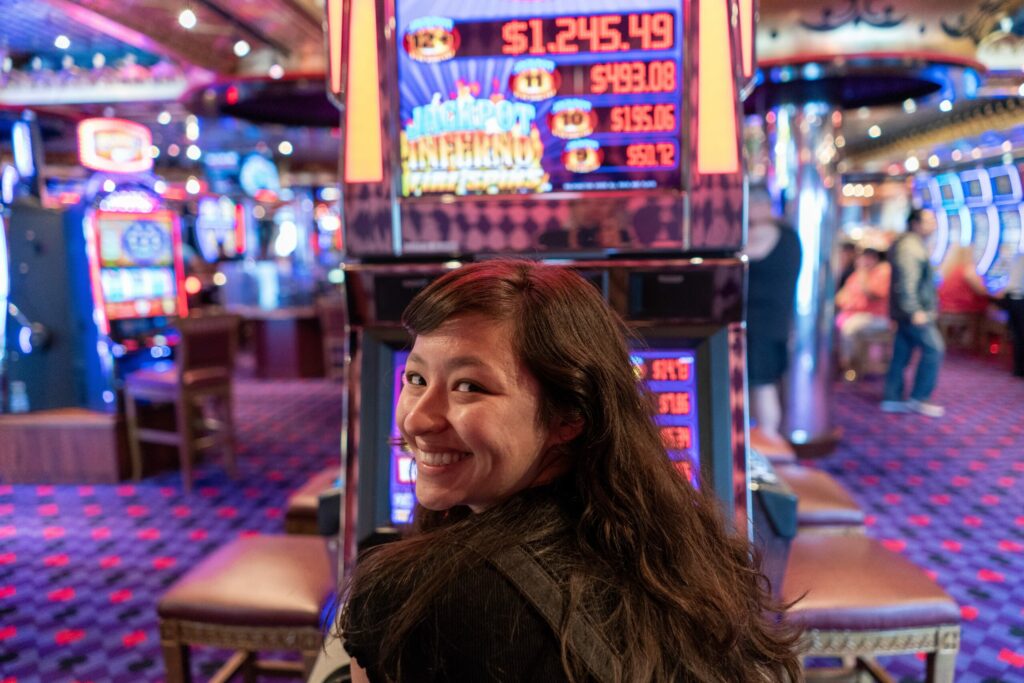 Woman gambling at a casino.